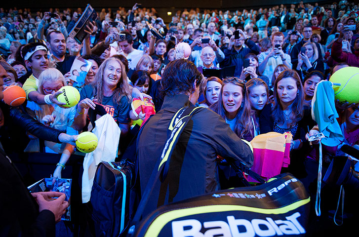 ATP Tennis: Rafael Nadal signs autographs
