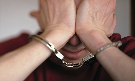 Man Stressing in Handcuffs