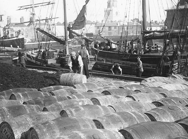 BAE job losses: Barrel are unloaded at Portsmouth Docks