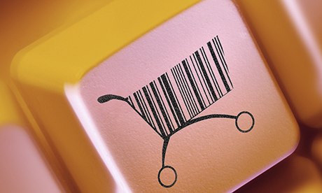 computer key with online shopping cart and barcode symbol for home internet buying