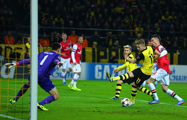 arsenal champions league: Marco Reus shoots