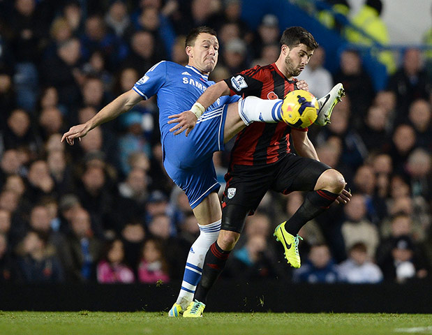 Saturday football roundup: Chelsea's John Terry challenges West Bromwich Albion's Shane Long 