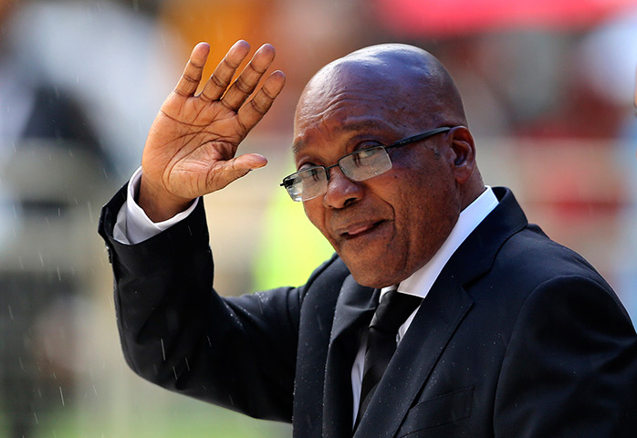 Memorial for Mandela: South African President Jacob Zuma waves 
