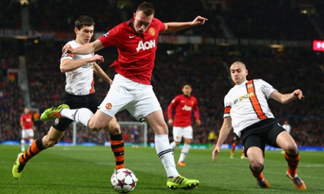 Phil Jones of Manchester United crosses the ball during the Champions League match against Shakhtar Donetsk.