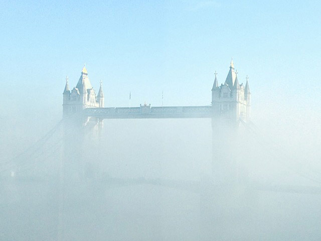 UK Fog - readers' photos: tower bridge obscured by fog