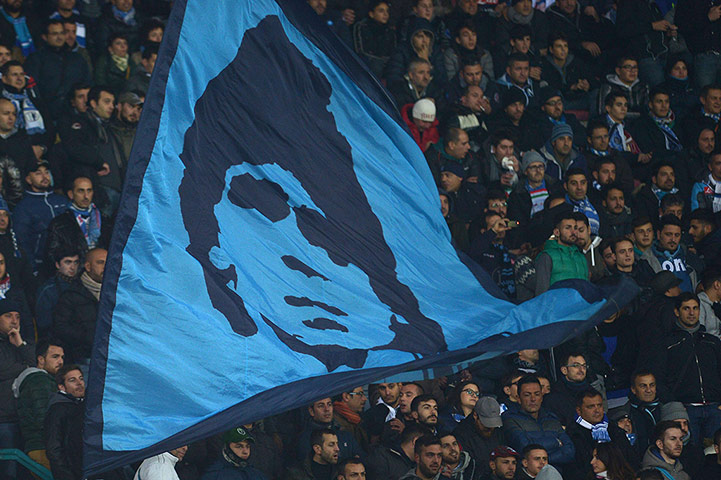 Napoli v Arsenal: Napoli's fans wave a giant flag