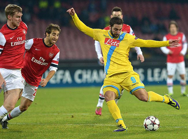 Napoli v Arsenal: Napoli's Argentinian forward Gonzalo Higuain scores