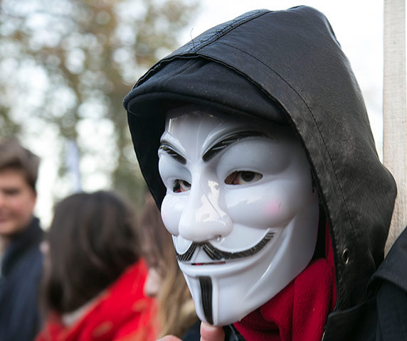 Cops off campus protest: protest photo anonymous mask