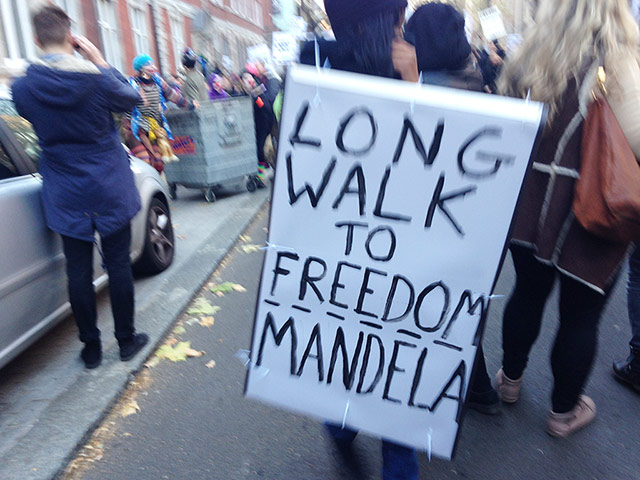 Cops off campus protest: student protestors carry Nelson Mandela placards