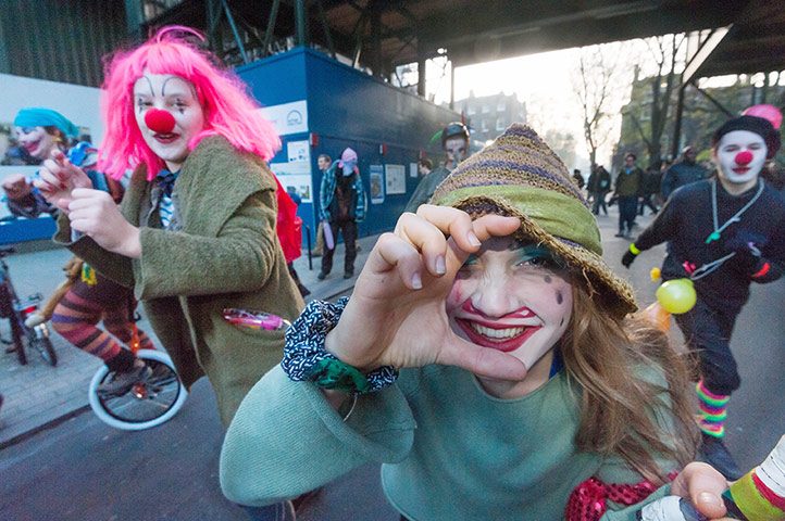 Cops off campus protest: Clown protestors cops off campus