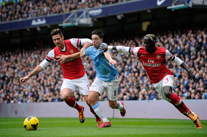Arsenal update: City's Samir Nasri battles Giroud and Sagna of Arsenal