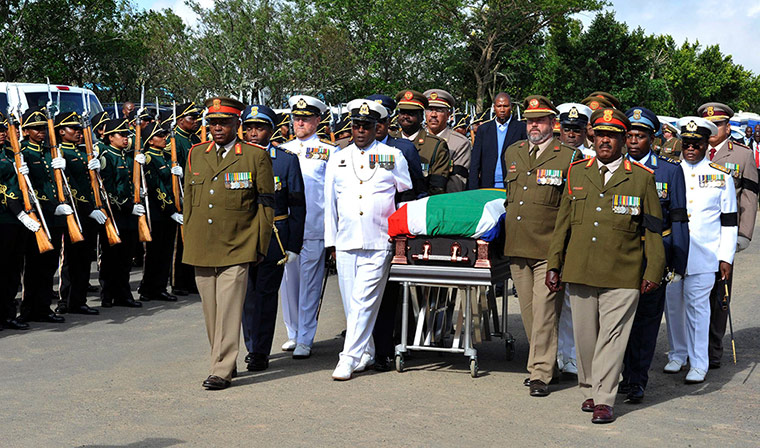 Nelson Mandela: The coffin arrives at Mandela's home