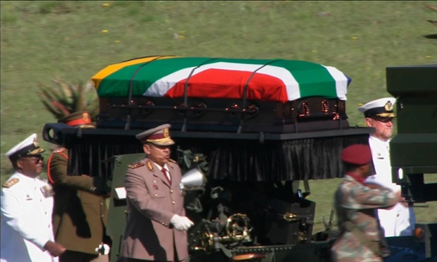 The coffin of Nelson Mandela is transported to his funeral in Qunu.