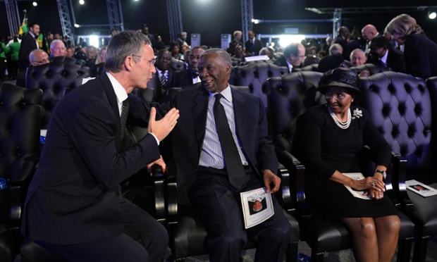 Former South African president Thabo Mbeki talks with Norway's former Prime Minister Jens Stoltenberg.