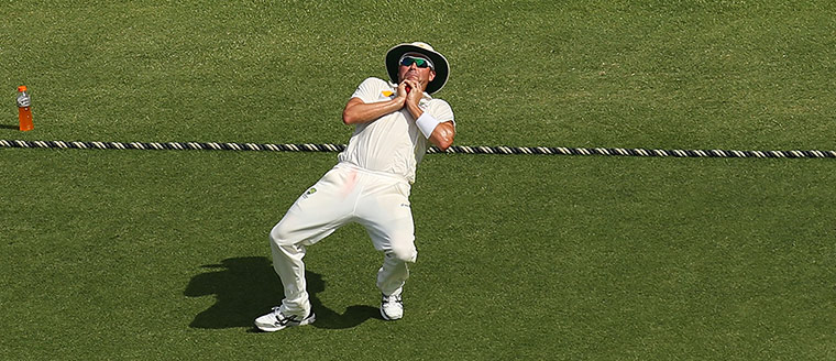 Ryan Harris catches the ball