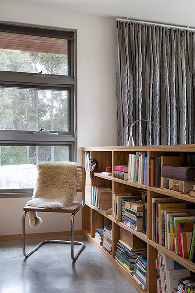Homes - Perth House: interior of room with bookcase and chair