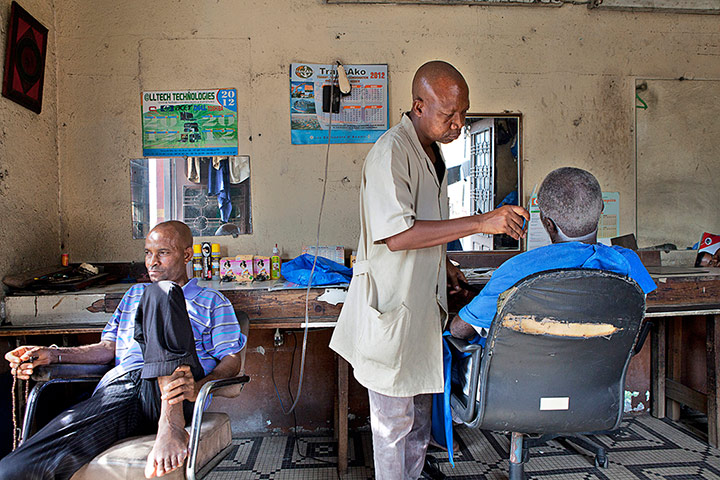 big picture - barbers: men in barber shop in Africa