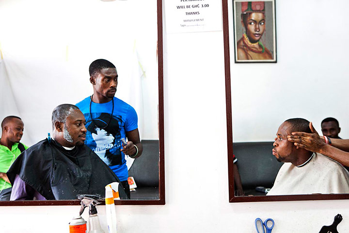 big picture - barbers: men in barber shop in Africa