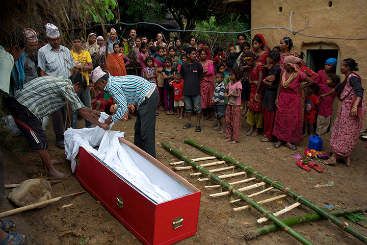 2013 in MDG: relatives of Ganesh Bishwakarma who died in Qatar