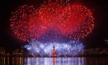 Fireworks explode from a Christmas tree