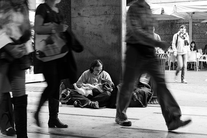 Your Pictures - pamper: black and white picture of homeless man sitting and cuddling dog 
