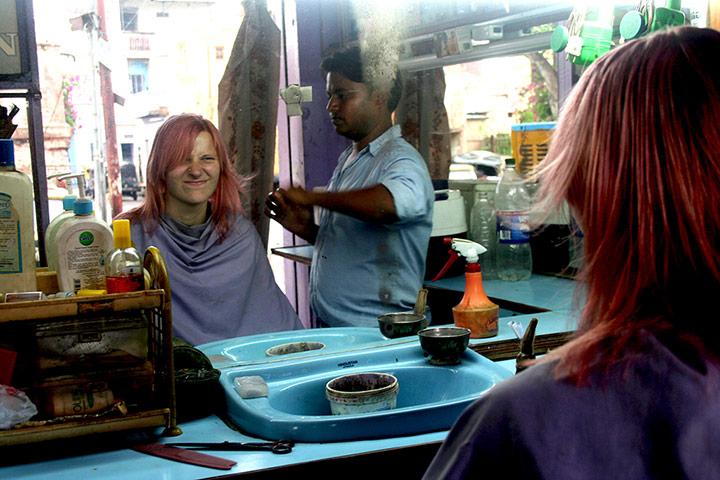 Your Pictures - pamper: girl with pink/red hair looking into barber's mirror with barber