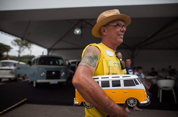 Volkswagen campers: Collector Marcos da Silva carries a miniature Volkswagen