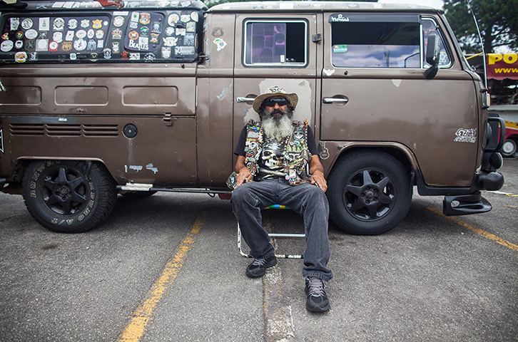 Volkswagen campers: Marco Antonio in front of his Volkswagen Kombi 