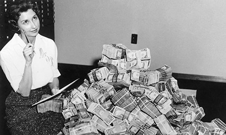 Lady with pile of money