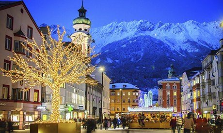Innsburck at night, with the Alps in the background