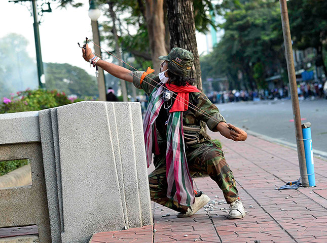 Thailand update: Protester aims catapult at Thai riot police