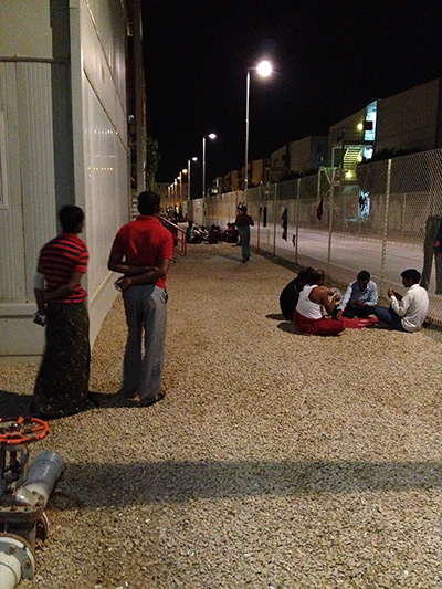 Abu Dhabi workers: Striking Bangladeshi workers keeping watch at 2am, in Saadiyat Construction