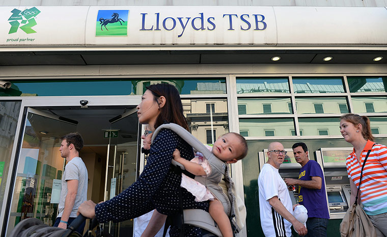 Business Review of Year: Britain's Lloyds back in black with profits of 2.1 billion pounds