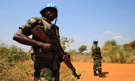UN soldiersl guard people displaced by fighting in Jabel, on the outskirts of the capital Juba.