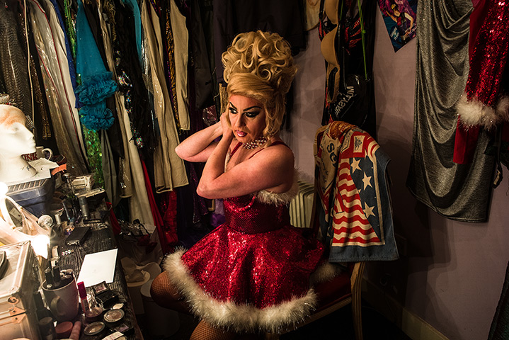 portraits of year: Zoe, host of the Funny Girls drag revue bar, prepares for a Christmas show