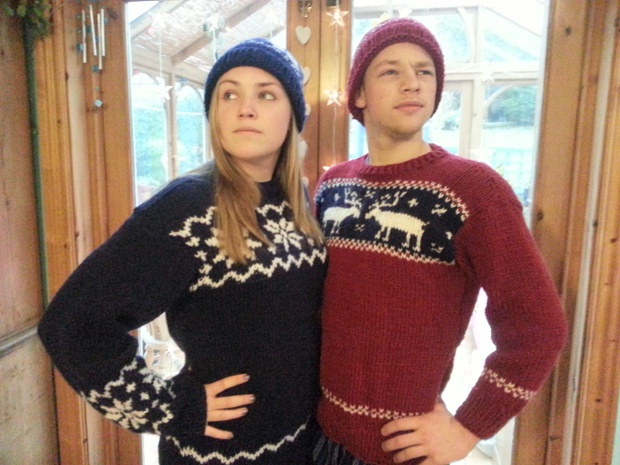 Brother and sister in jumpers and hats