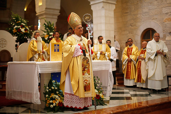 Christmas Day: A service in the Church of St. Catherine in the West Bank