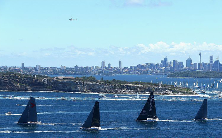 Sydney to Hobart: 'Wild Oats XI' leads the fleet out to sea