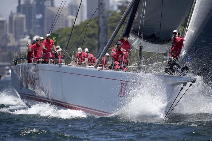 Sydney to Hobart: Wild Oats XI maneuvers in Sydney Harbour 