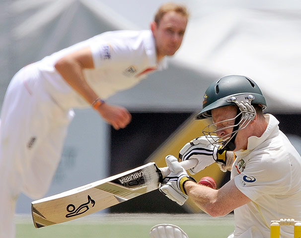 Fourth test day two: Chris Rogers is struck by a Stuart Broad delivery