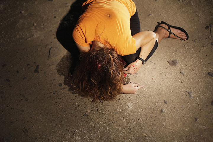 20 Photos: The dead body of a woman at a crime scene in San Pedro Sula, Honduras