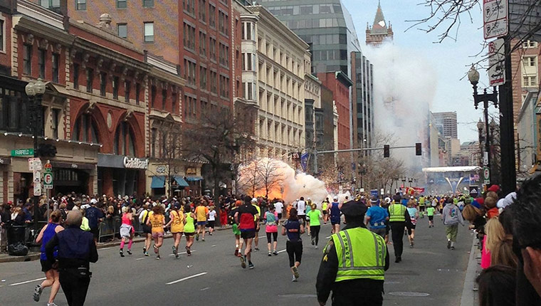 20 Photos: Runners at the finish line of the Boston Marathon after an explosion