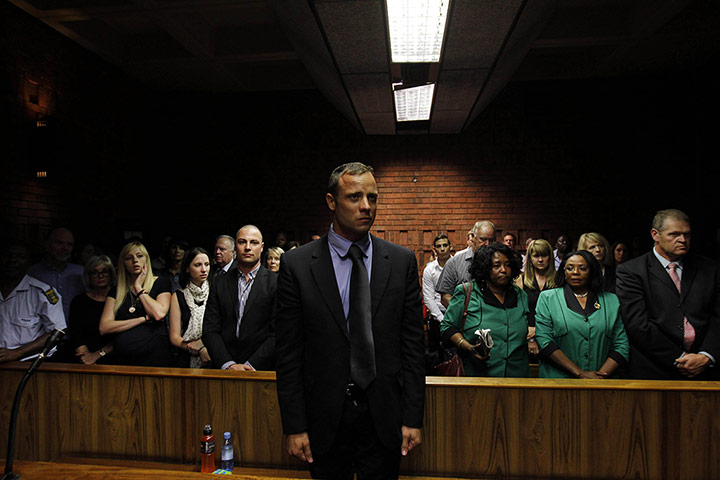 20 Photos: Oscar Pistorius at the start of proceedings in Pretoria Magistrates Court