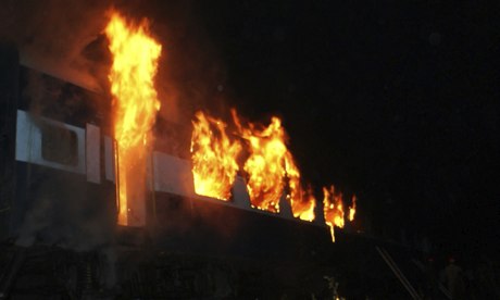 The train engulfed in flames in southern India