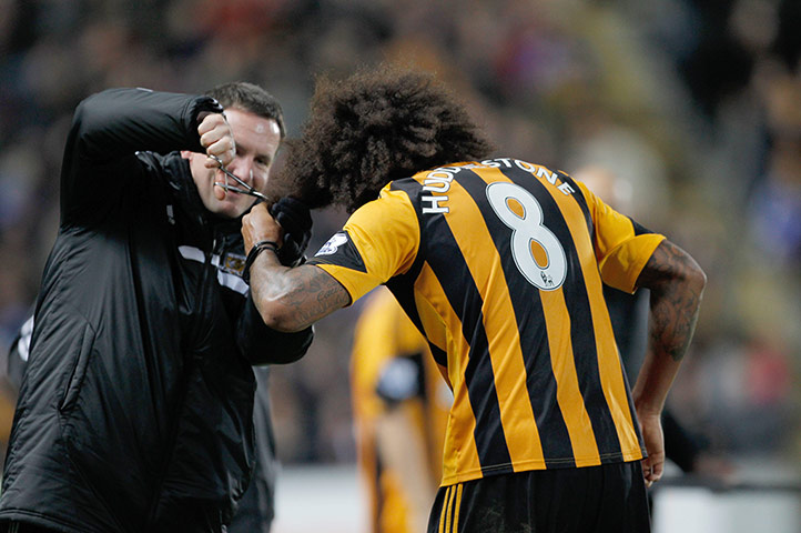 premier league: Tom Huddlestone gets a haircut