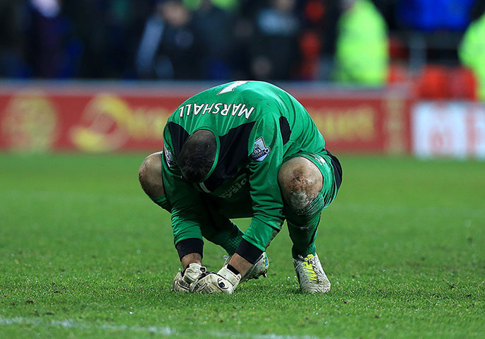 premier league: Cardiff City goalkeeper David Marshall is dejected