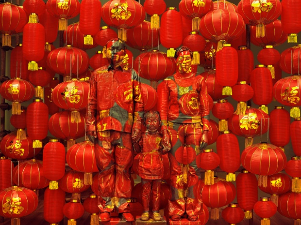 'Family Photo' a Chinese family are camouflaged by Liu Bolin in Beijing, China.