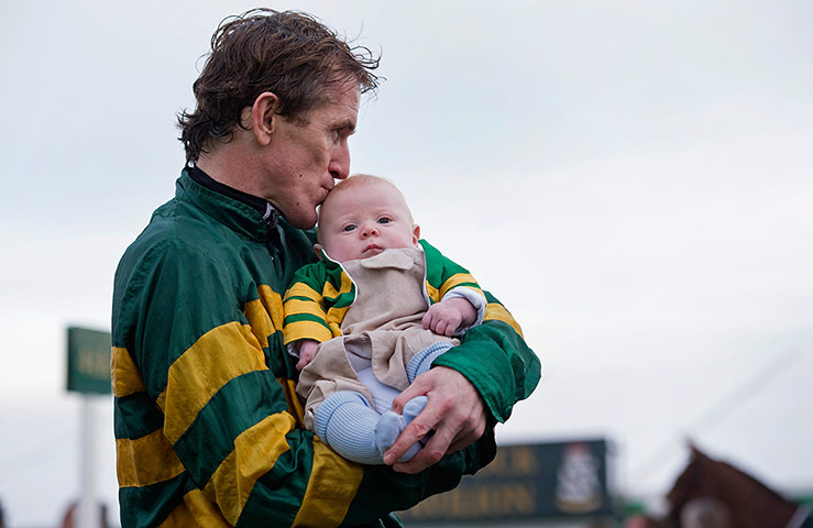 Tom Jenkins Pix of Year: AP McCoy kisses his baby son Archie after his 4,000th victory 