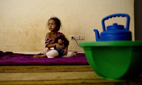 A displaced Malian girl from Timbuktu at her family's refuge in Bamako