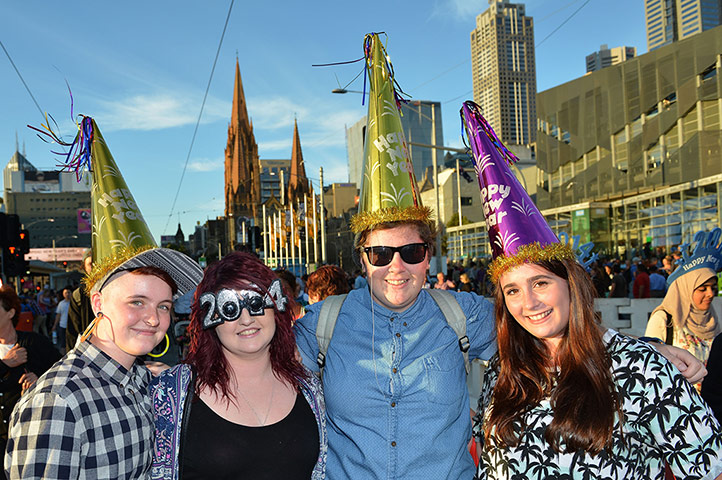 NYE in Australia: Revellers pose on Princes Bridge